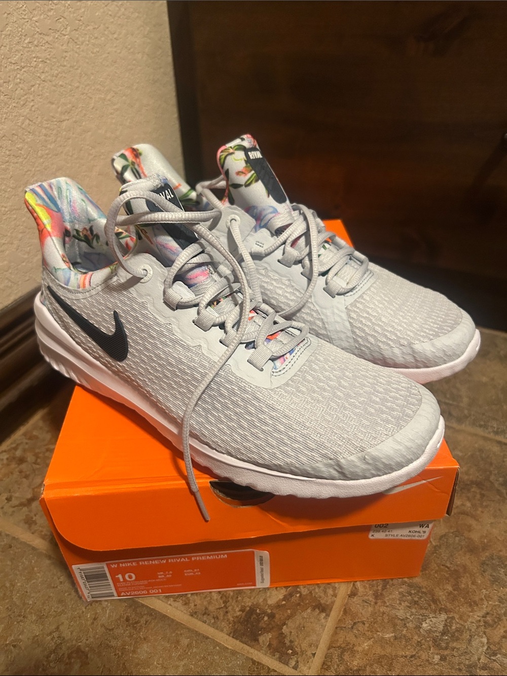 Nike Light Gray Women's Athletic Sneakers with Floral Accent
